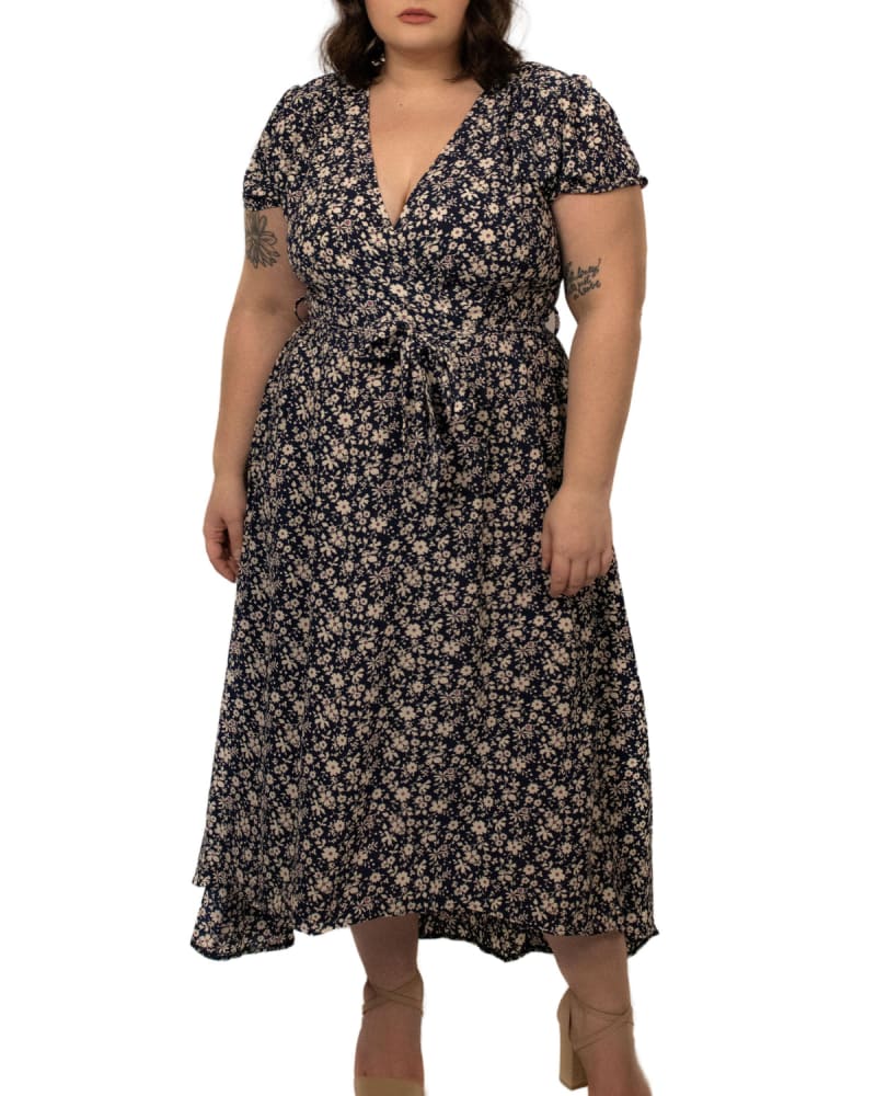 Front of a model wearing a size XL Ella Maxi Dress Floral Print V Neck Navy in Navy by ANNICK. | dia_product_style_image_id:290471